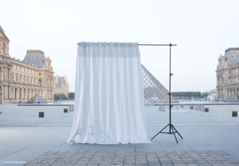 WINDOW Made to Measure curtains in front of the Louvre Pyramid